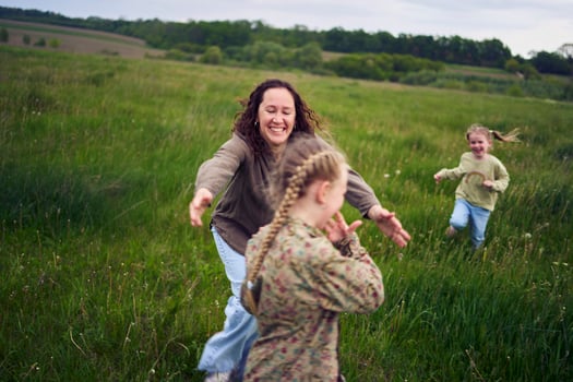 mother plays catch up with her daughters photo