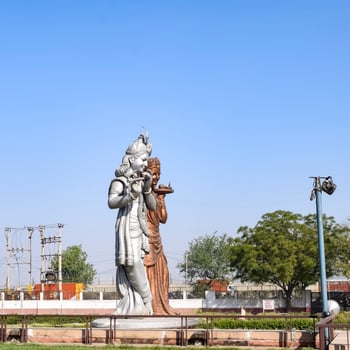 Big statue of Lord Radha Krishna near Delhi International airport, Delhi, India, Lord Krishna and Radha big statue touching sky at main highway Mahipalpur, Delhi photo