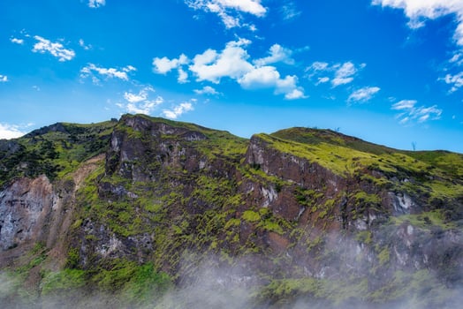 Mountain with fog on blue sky with cloud in the morning. photo