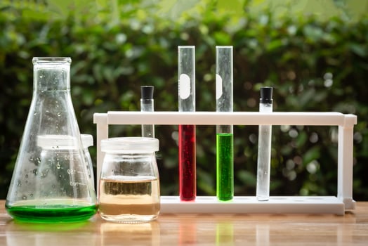 Test tubes with colorful chemical on table. Science chemistry concept. photo