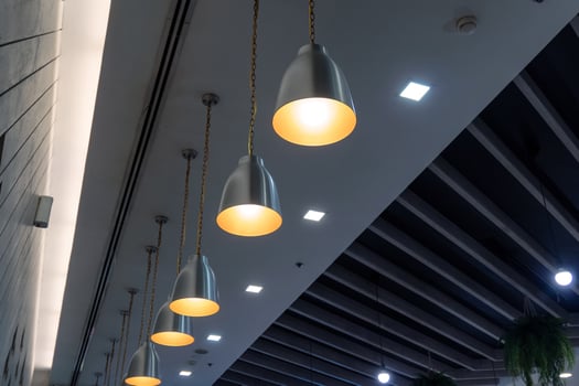 Modern lamps arrangement hanging on ceiling photo