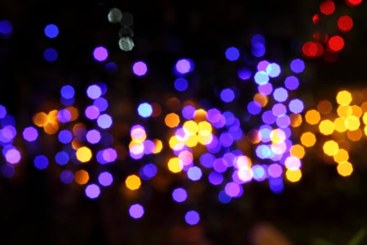 colorful and defocused lights on black background photo