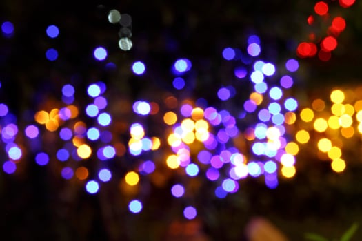 colorful and defocused lights on black background photo