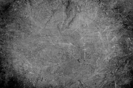 Textured Stone Surface with Scratches in Monochrome photo