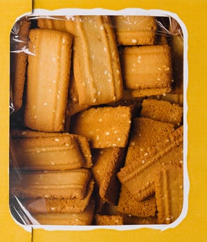 Top view of boxed butter cookies close up photo