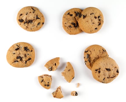 Cookies with pieces of chocolate on a white background photo