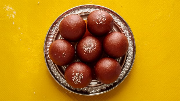 Sweet Food Gulab Jamun on a plate photo