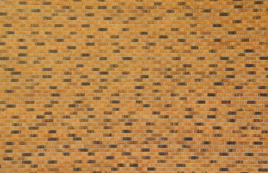 Dark brick wall pattern with chaotic masonry order. Background texture or resource for 3d texturing. Many bricks in big modern stone wall photo
