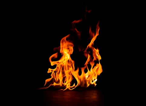 fire burning flame Isolated on a black background photo