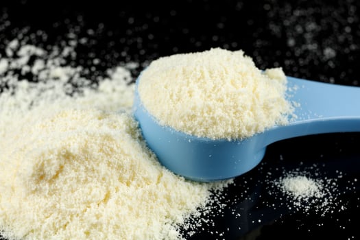 Yellow baby food powder in a pile. photo