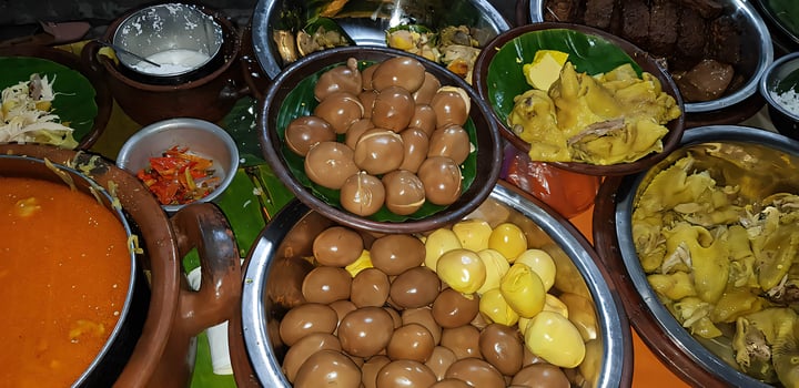 dishes served in Indonesian food Liwet Rice. Traditional javanese Rice Served with Chicken, Tofu, Tempeh, vegetable, Chili, egg photo