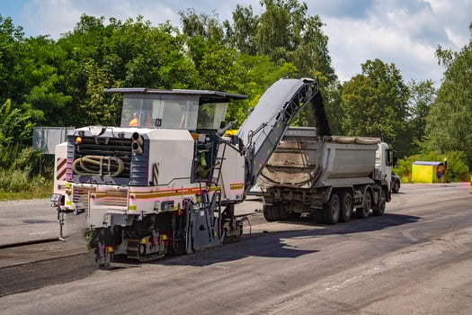 Modern equipment for road construction. Asphalt vehicle for repairing highway. photo