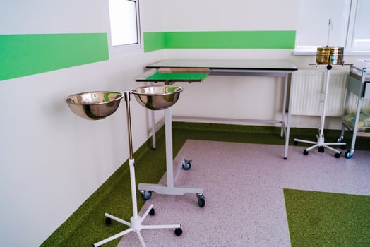 Closeup image of medical and surgical solution bowls. Medical equipment prepare for surgery operations in infirmary room. photo