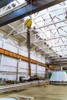 Industrial metal warehouse. Crane system building. photo