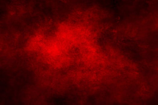 Vibrant Red Powder Explosion on Dark Background. photo