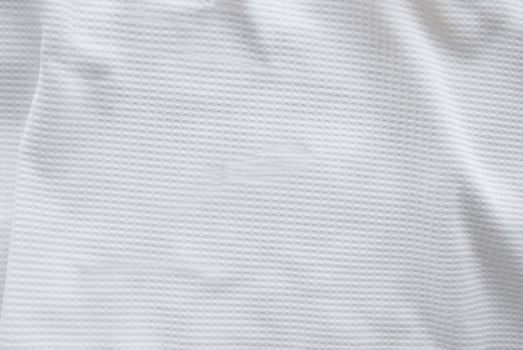 Abstract Background of White Sports Clothing Fabric Texture photo
