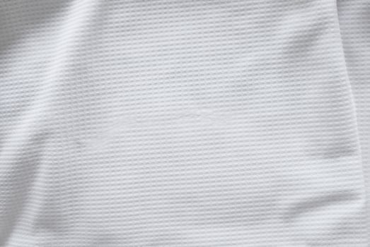 Abstract Background of White Sports Clothing Fabric Texture photo