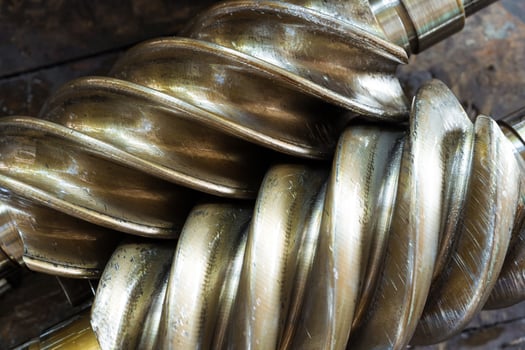 Details of a old screw compressor that has been in operation for a very long time. photo