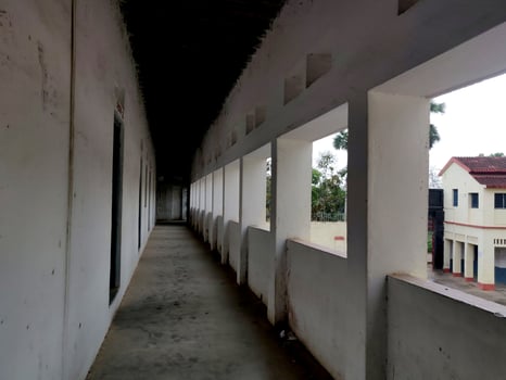 Empty Walkway in an old school corridor in an Indian village Bihar photo