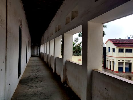 Empty Walkway in an old school corridor in an Indian village Bihar photo