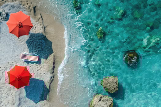 Drone view of amazing beach with umbrellas and lounge chairs beds close to turquoise sea. Top of summer beach landscape, inspirational couple vacation, romantic holiday. Freedom travel photo