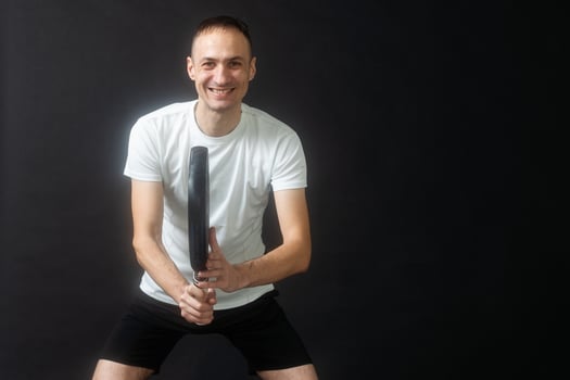 Young man playing the paddle photo