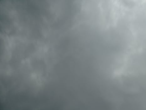 Gloomy overcast moody cloudy sky background photo