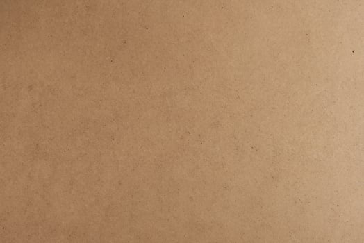 Horizontal Kraft Paper Texture Sheet on Cardboard Brown Background photo