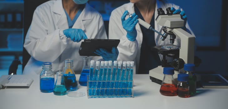 professional chemist woman laboratory using scientific microscope for science research, chemistry scientist with microbiology medicals equipment technology to working with medicine biology experiment photo