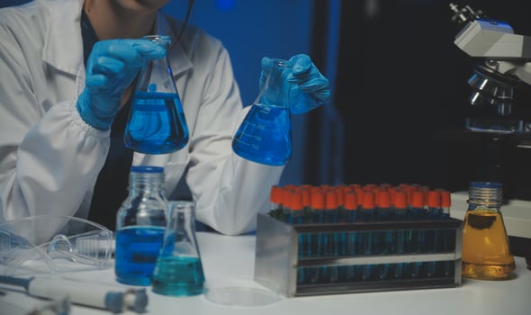 professional chemist woman laboratory using scientific microscope for science research, chemistry scientist with microbiology medicals equipment technology to working with medicine biology experiment photo