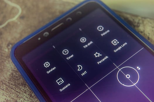 a smartphone that displays features in the camera application photo