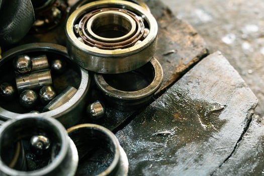 Many old bearings that has been in operation for a very long time. Machinery concept. Set of various gears and ball bearings old. photo