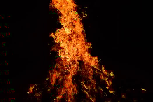 Fire flames on black background, Blaze fire flame texture background, Beautifully, the fire is burning, Fire flames with wood and cow dung bonfire photo
