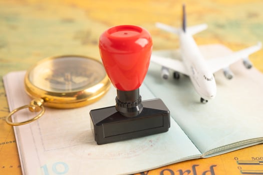 Approved Stamp visa and passport document to immigration at airport in country. photo