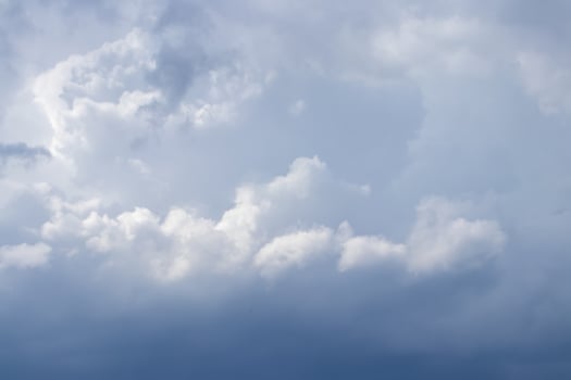 Cumulus clouds in the sky in cloudy weather. Abstract background. photo