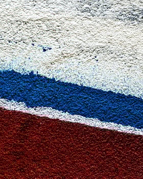Fragment of colored graffiti painted on a wall. photo