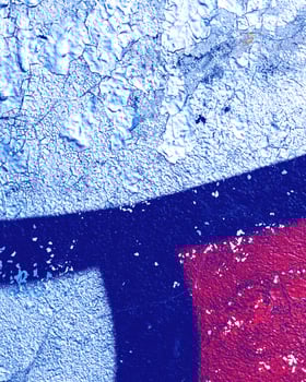 Fragment of colored graffiti painted on a wall. photo