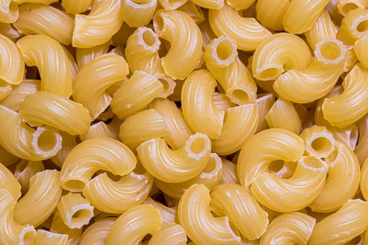 Top view of Italian uncooked chifferi pasta. photo