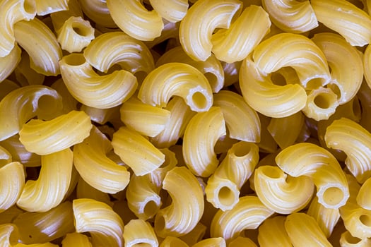 Top view of Italian uncooked chifferi pasta. photo