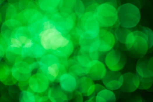 Green lights abstract bokeh backdrop. Chrismas lights bokeh. photo