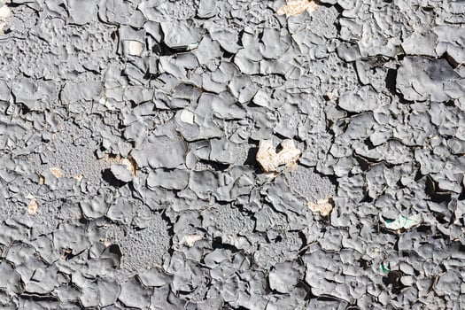 Texture of old white peeling paint on a concrete surface. Abstract backdrop for design. photo