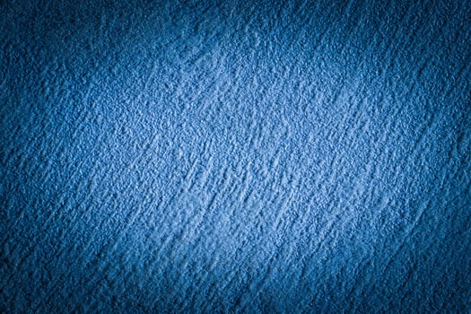 Blue decorative plaster texture with vignette. Abstract grunge background with copy space. photo