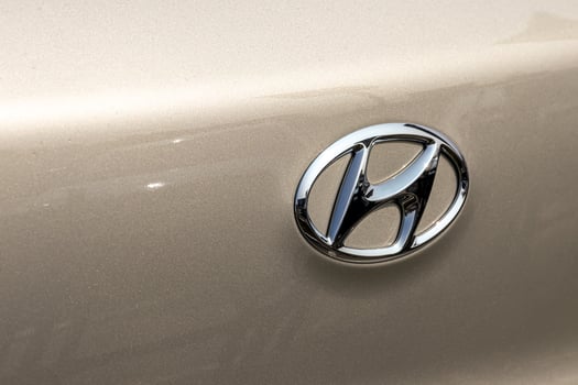 Russia, Kaluga - SEPTEMBER 29, 2020 Chrome-plated Hyundai logo on the trunk of a new car. photo