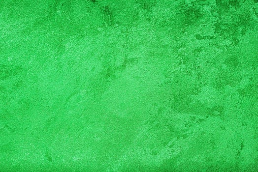 Texture of green decorative plaster or concrete. Abstract grunge background. photo