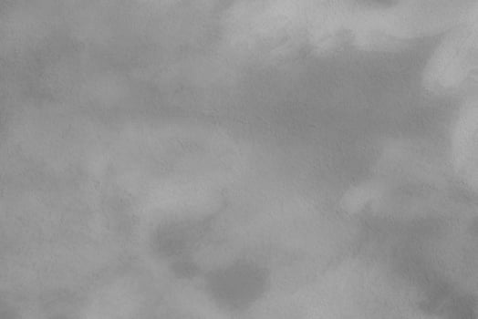 Blured gray decorative plaster or concrete. Abstract grunge background for design. photo