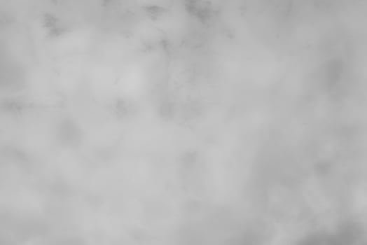 Blured gray decorative plaster or concrete. Abstract grunge background for design. photo