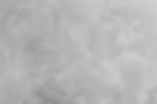 Blured gray decorative plaster or concrete. Abstract grunge background for design. photo