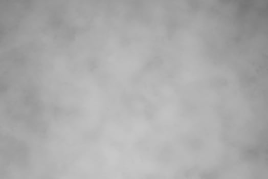 Blured gray decorative plaster or concrete. Abstract grunge background for design. photo