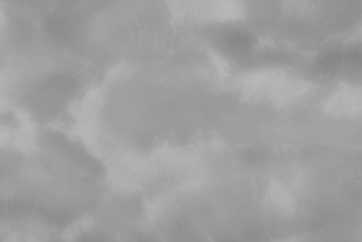 Blured gray decorative plaster or concrete. Abstract grunge background for design. photo