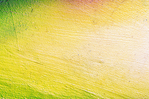 A fragment of colorful graffiti painted on a wall. Abstract urban background. photo